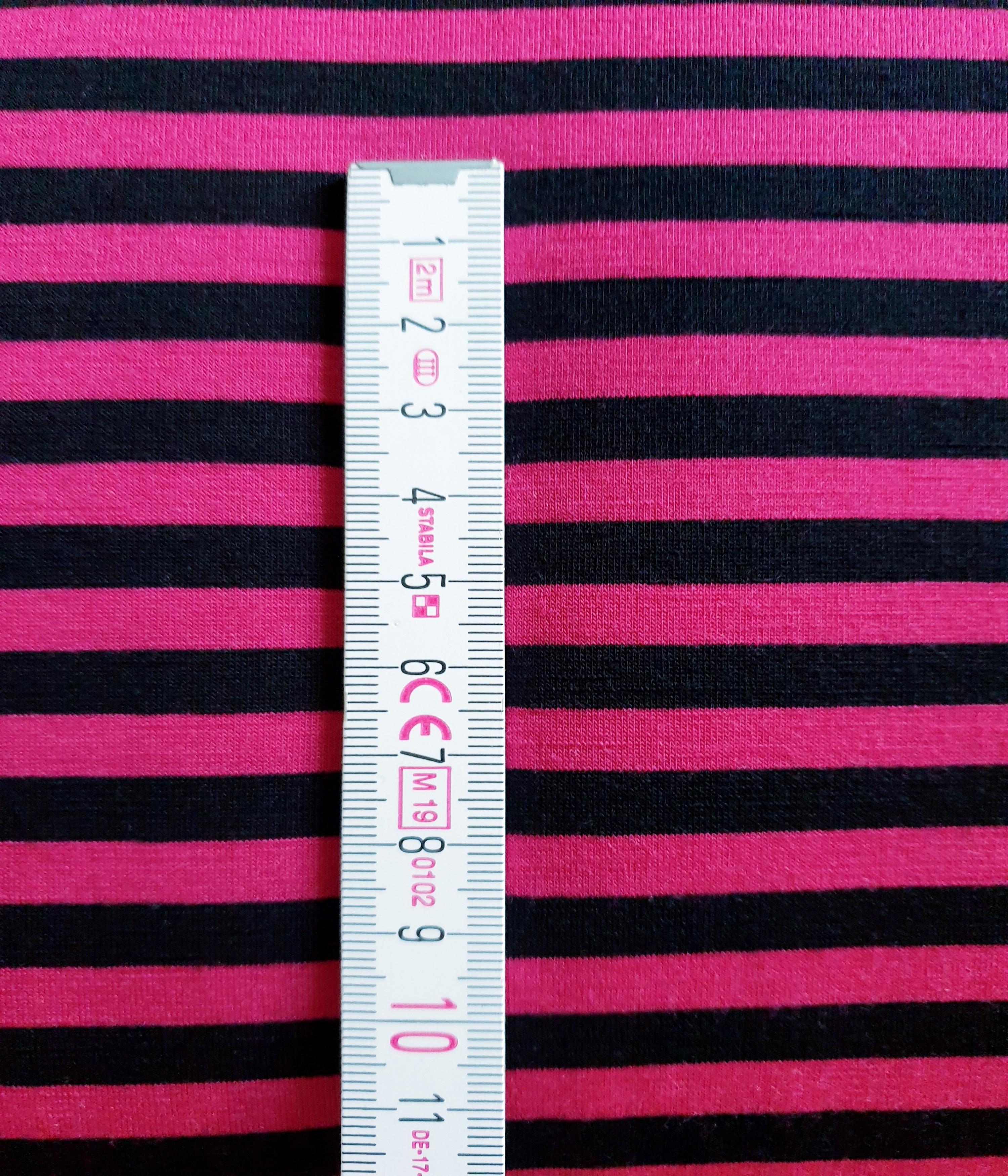 Dickerer Merino Singlejersey Fuchsia/ Schwarz gestreift